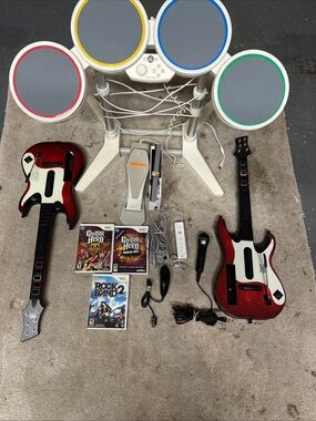 Wii Rock band guitar hero bundle w/2 games drum set Wii console 3 games and mic